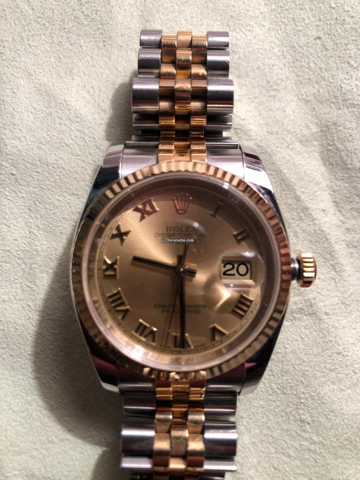Rolex Oyster Perpetualyear 2009. Vintage. 18k gold. Stamps of authenticity.