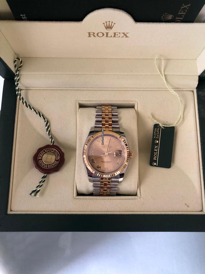Rolex Oyster Perpetualyear 2009. Vintage. 18k gold. Stamps of authenticity.