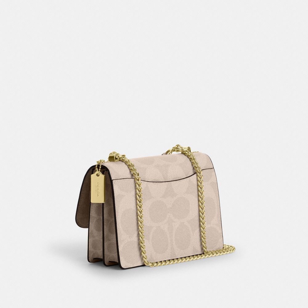 Coach Klare Crossbody Bag In Blocked Signature Canvas Gold Sand Tan