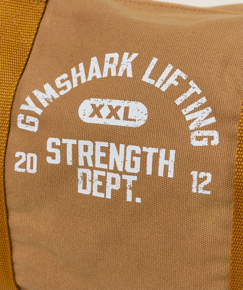 Gymshark Strength Dept Mini Canvas Duffle Bag Antique Gold